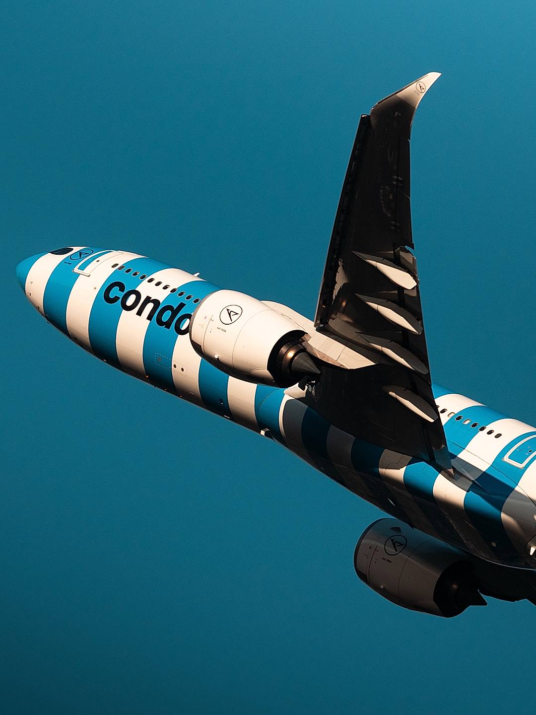 Condor A330 climbing out of SEA about an hour before sunset 