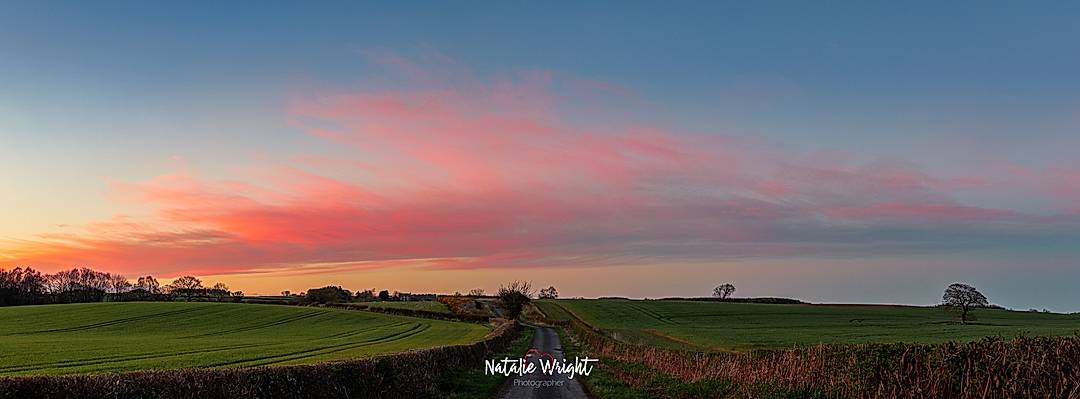 Just north of Morpeth, on the road up to Hebron, this is just as the sun set, looking north to Shield Hill farm.