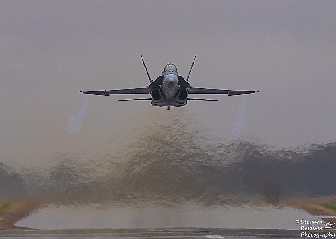 Head on with RAAF F/A-18A Hornet departing Temora Airport for the last time on 20-11-2021.
