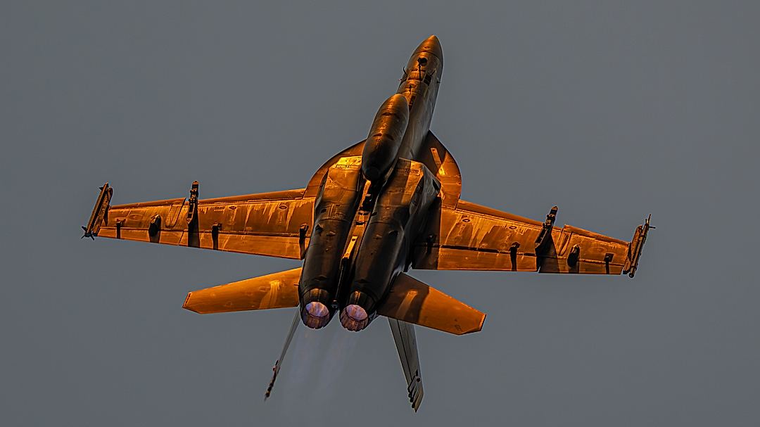 RAAF F-18F display over Mindil beach going belly up to the setting sun during the Pitch Black 2026 flying display.