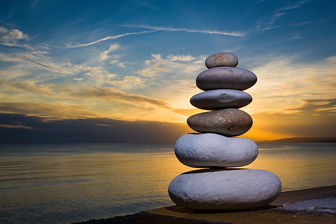 Sunset on a small stone sculpture.