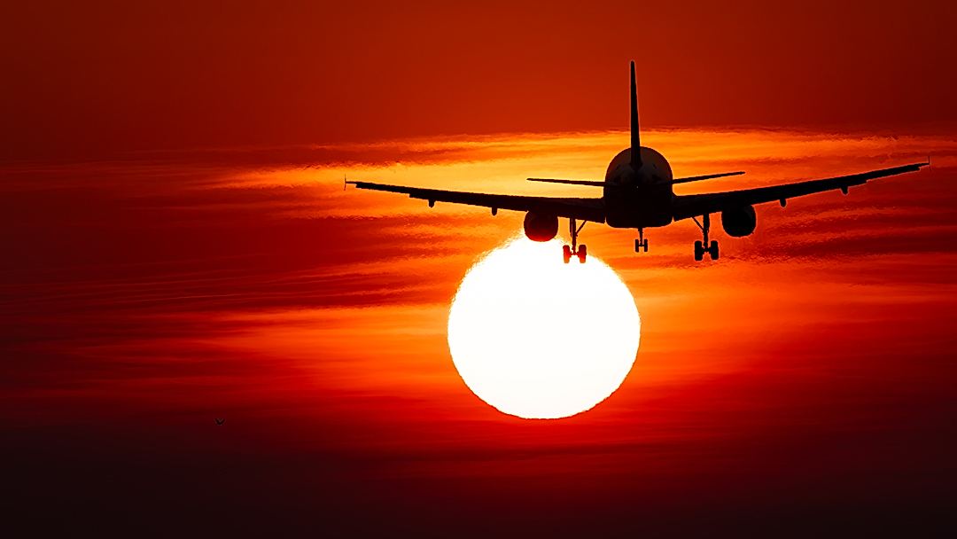 Darwin airport, Northern Territories, Australia. landing into the setting sun, difficult when the sun and runway are in alignment.