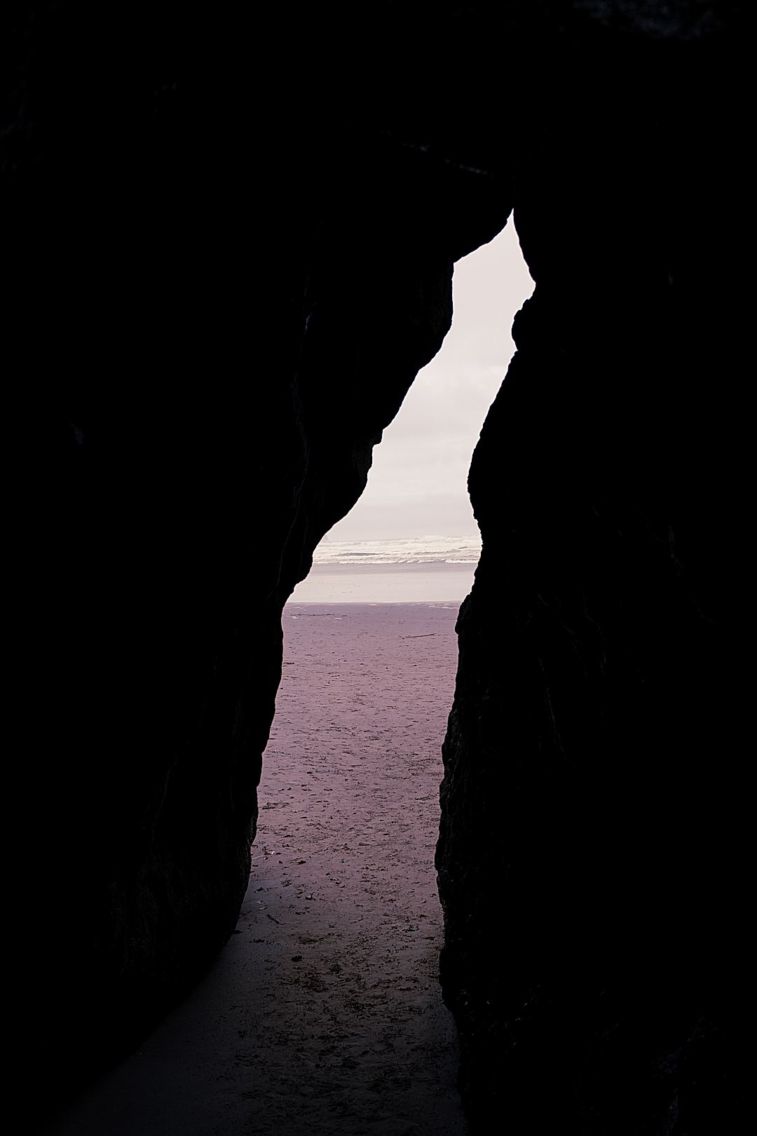 Watch the ocean through a sea cave in Oregon