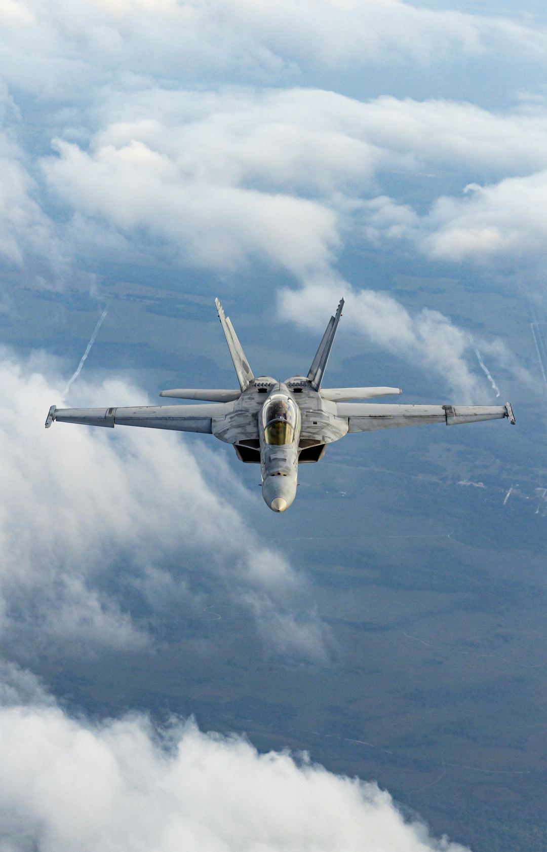 F-18 soaring above the clouds behind my photo aircraft. What a truly amazing jet this is. 