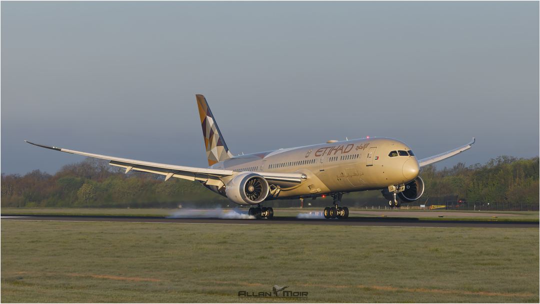 Etihad B787/9 Dreamliner touches down on 05R at EGCC on a cold & frosty morning during a glorious sunrise.