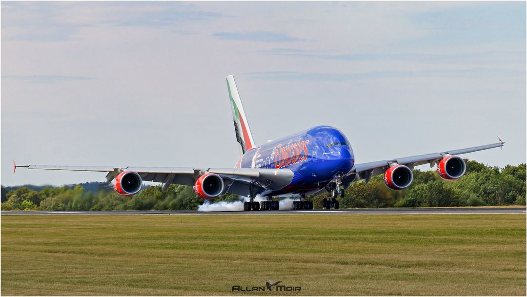 Emirates A380-861 in NBA colours touches down on 05R at EGCC having arrived from Dubai.