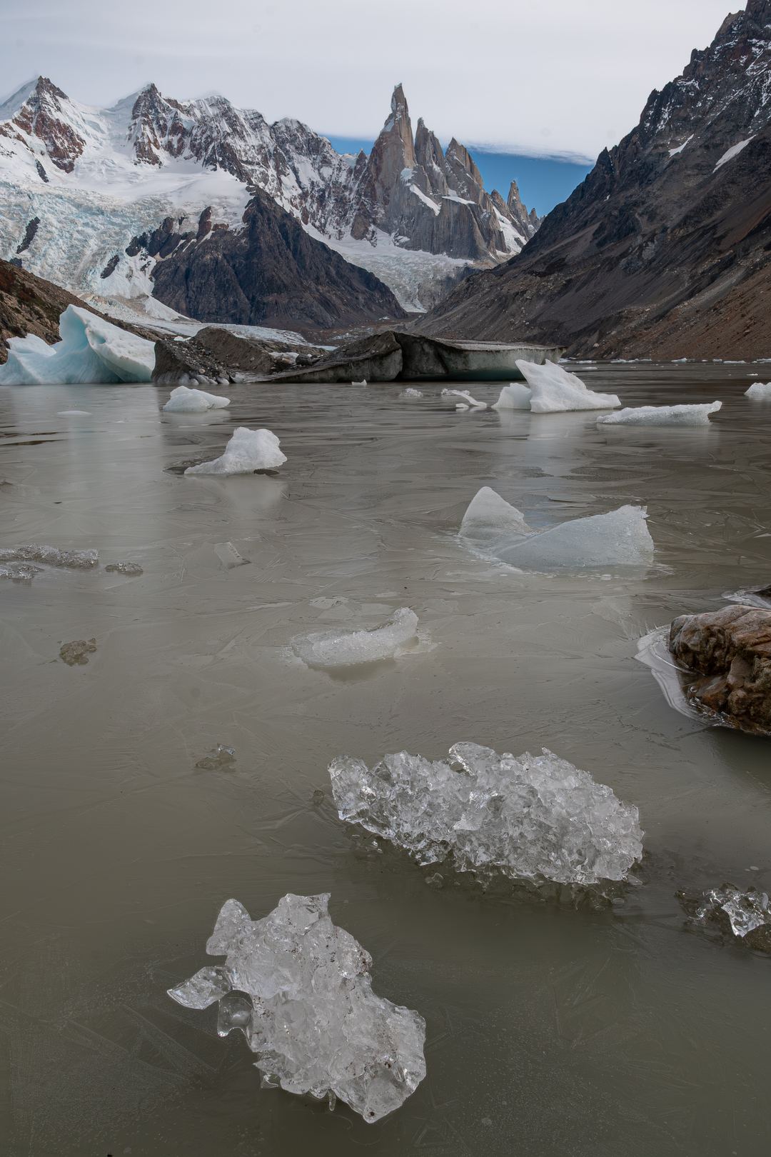 Winter is coming.. 

The first signs of winter appear at Laguna Torre, Patagonia with ice starting to form on the lake