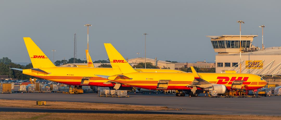 The DHL ramp at East Midlands Airport becomes a hive of activity as a cargo hub in the evening. I took this from a verge at the end of the runway.