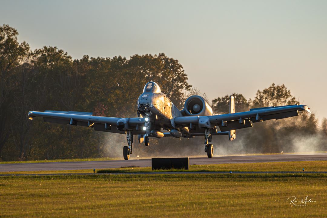 A-10C Thunderbolt II on touchdown at Warbirds Over Monroe 2024. Late fall afternoon with the sun almost directly on the tail.