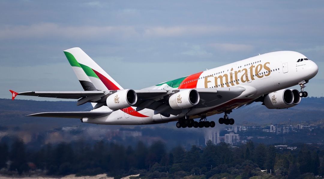 Emirates’ A6-EVG lifting off of 34L on a short hop to CHC
