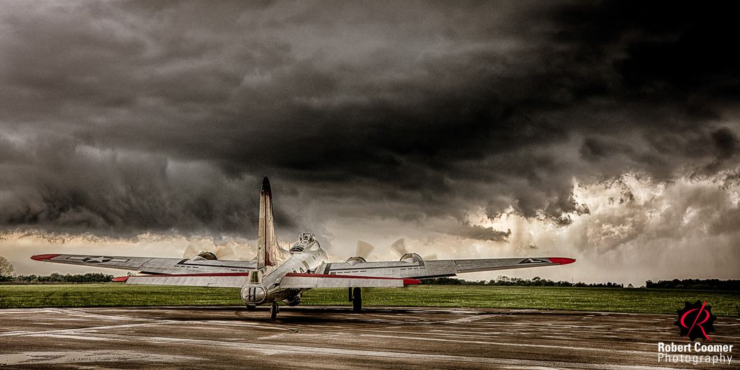 Into the Storm: B-17 Yankee Lady

Story: B-17 Yankee Lady faces an approaching storm. The threatening clouds become a metaphor for the brutality of war and the uncertainty of what lies ahead. Images is an HDR edit with 5 exposures.

Intention: To use the storm to create a dramatic portrait of a weathered warbird.

Attention: The brightest light catches her tail and fuselage, leading your eye forward toward the cockpit, as though she's preparing for takeoff.

Captivation: Your eye follows the aircraft toward the massive storm ahead. You can't help imagining what it would be like to fly into those clouds. It's going to be a bumpy ride…