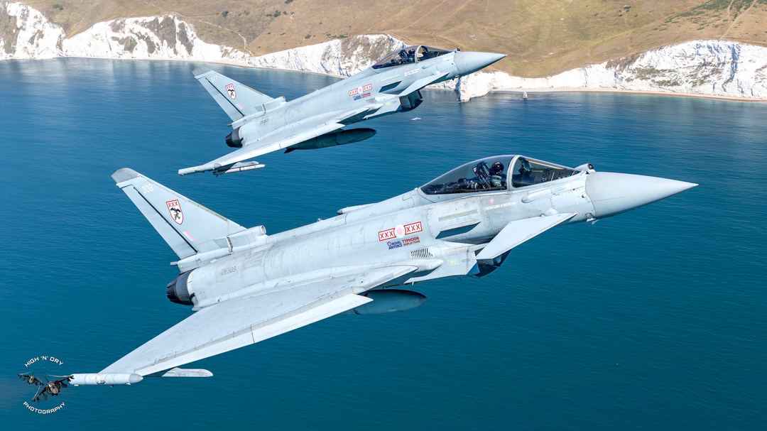 RIOT01 ( David Leighton) and RIOT02 (Tom Nation - Dragon01) low over the Dorset coast.