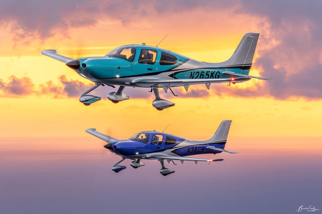 Two cirrus in flight with a stunning Florida sunrise