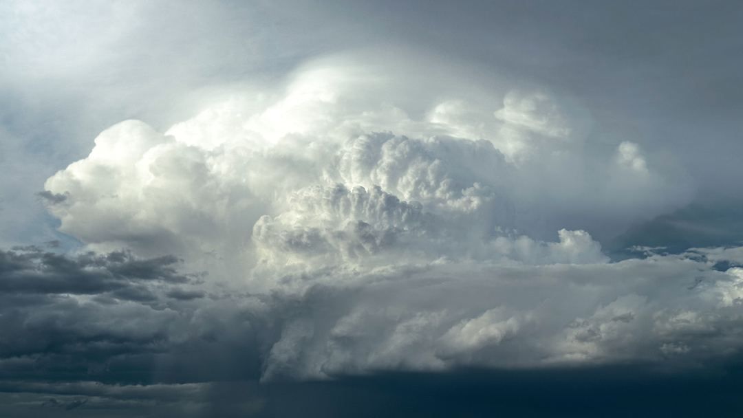 Beautiful Mesocyclone structure on a low-topped supercell north of Denver airport this September!