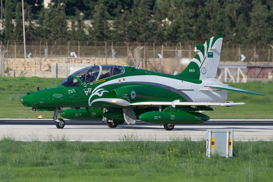 A stunning Saudi Royal Air Force British Aerospace Hawk Mk.165 (8801) taxiing to depart from runway 31R at Malta International Airport (LMML).  This airframe is part of a nine ship aerobatic display team, the Saudi Hawks, or Al-Suqoor Al-Saudiyyah.