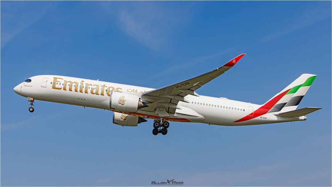 Emirates A350-941 A6-EXP departs 23L at EGCC returning to Dubai.