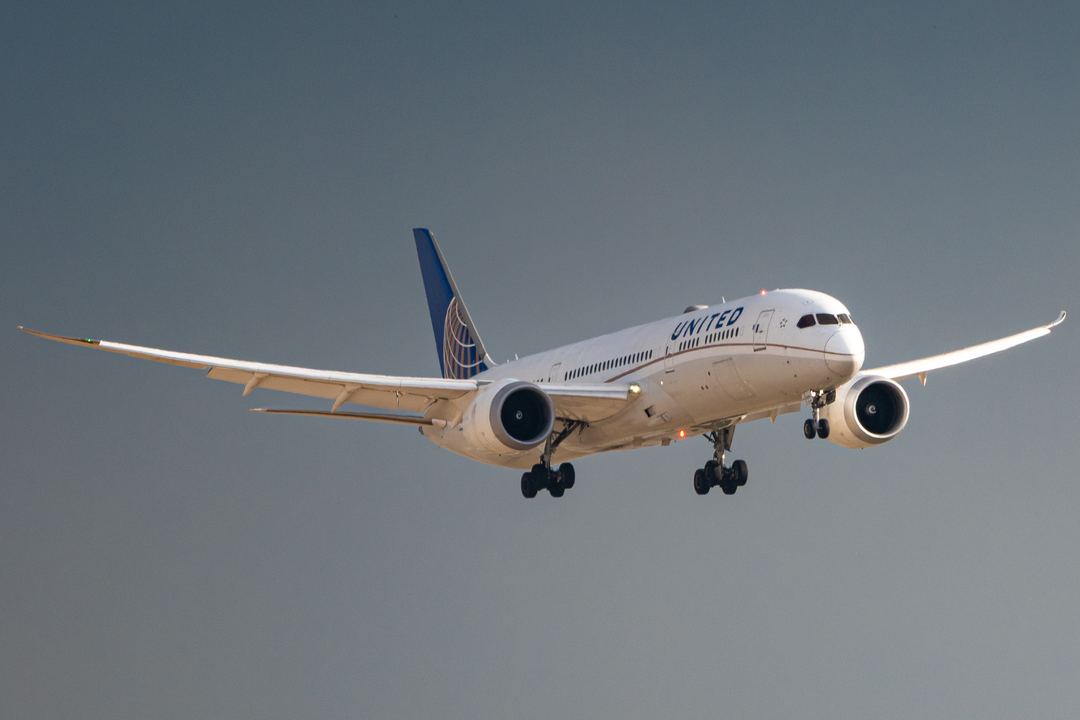 Stormy backdrop and 787 landing on 34R in Denver