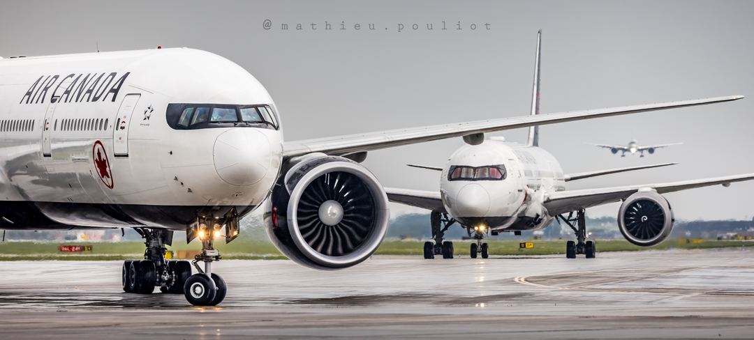 Heavies! A mix of airliners arrivals into Montreal. Air Canada B777 and B787 followed by a Qatar A350 on short final.