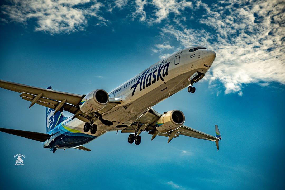 Alaska Air Lines on approach into San Antonio. Dangerous but fun, my hotel room window opened and over looked the pattern. Pretty cool experience. 