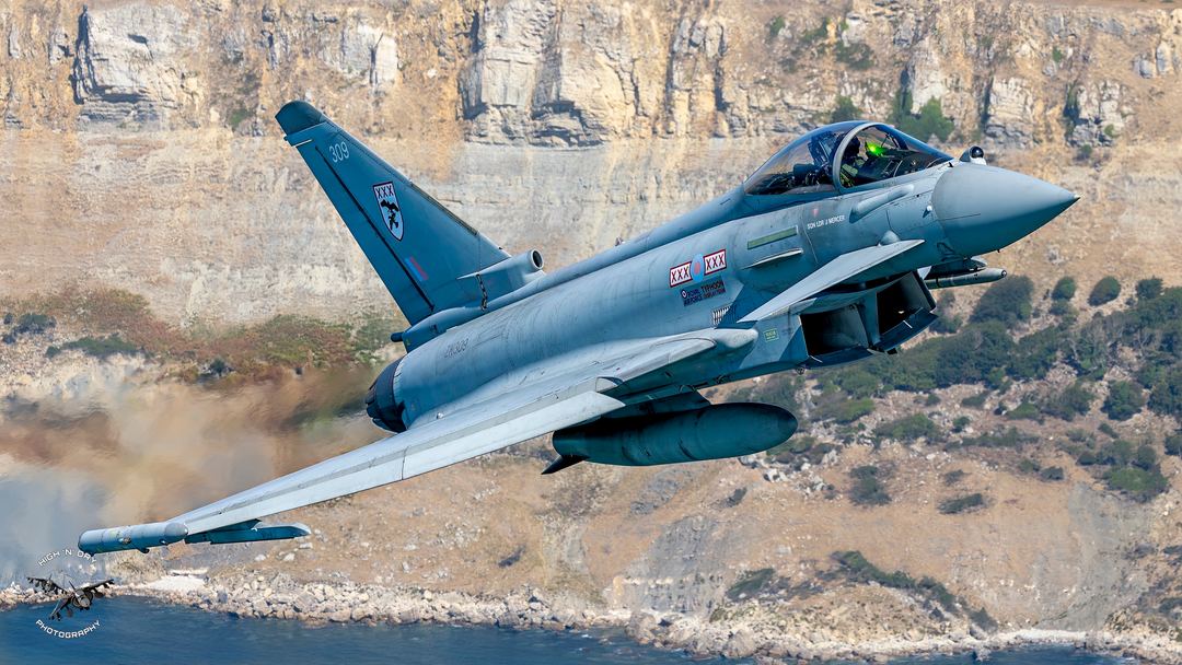 RIOT01 ( David Leighton) low over the Dorset coast.