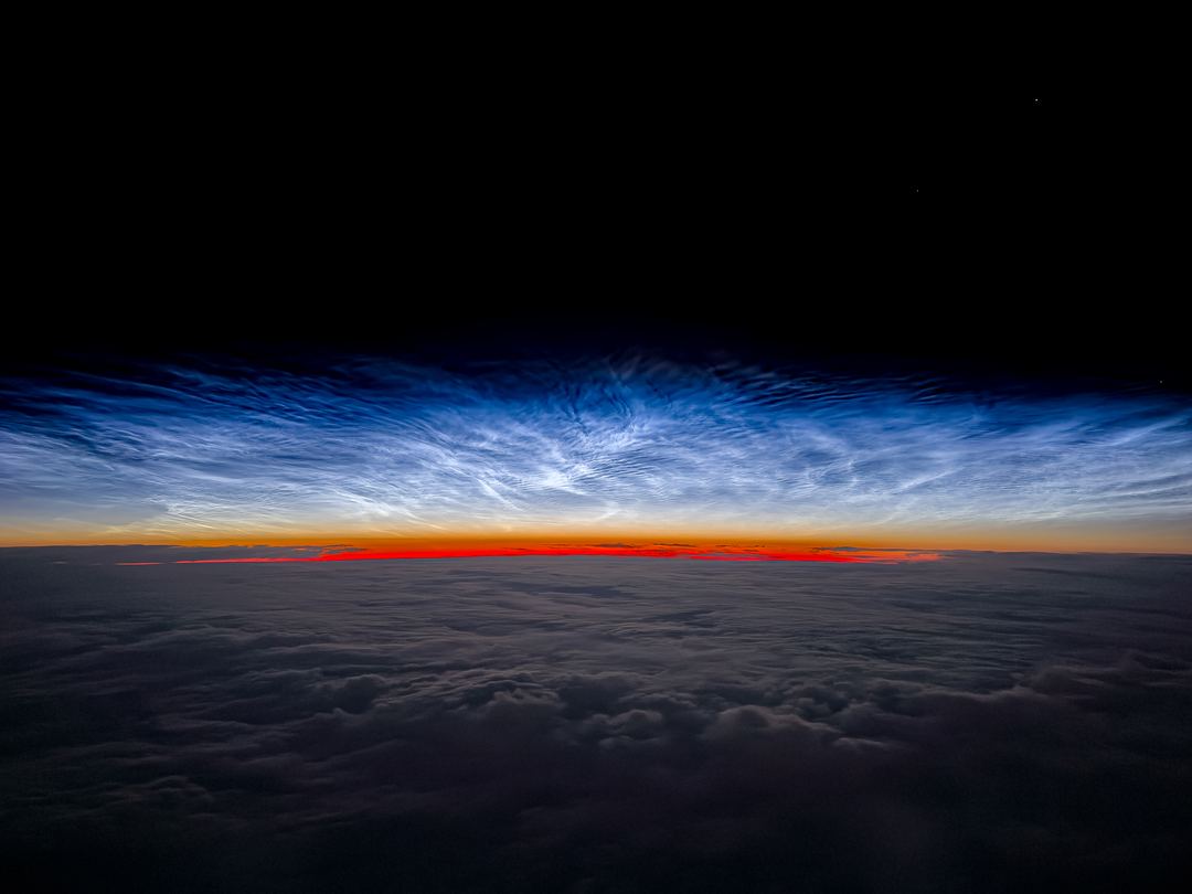 Fantastic Noctilucent clouds over Northern Canada last week. This is the longest lasting and most vivid display of these rare cloud formations I have ever seen. I truly get to see the most wonderful things from my window seat in the pointy end of an airplane. 