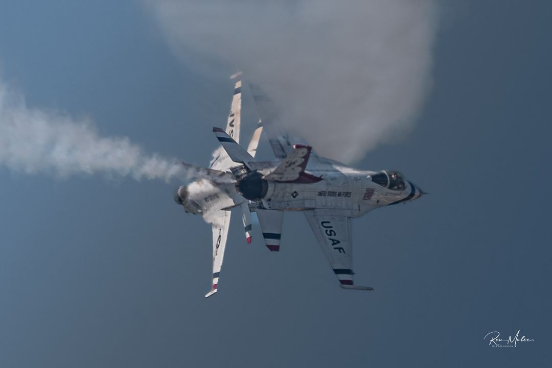 Cropped in closer to get the aircraft crossing, increased texture on the airplanes and lightened sky on the left to denote where the light was coming from.