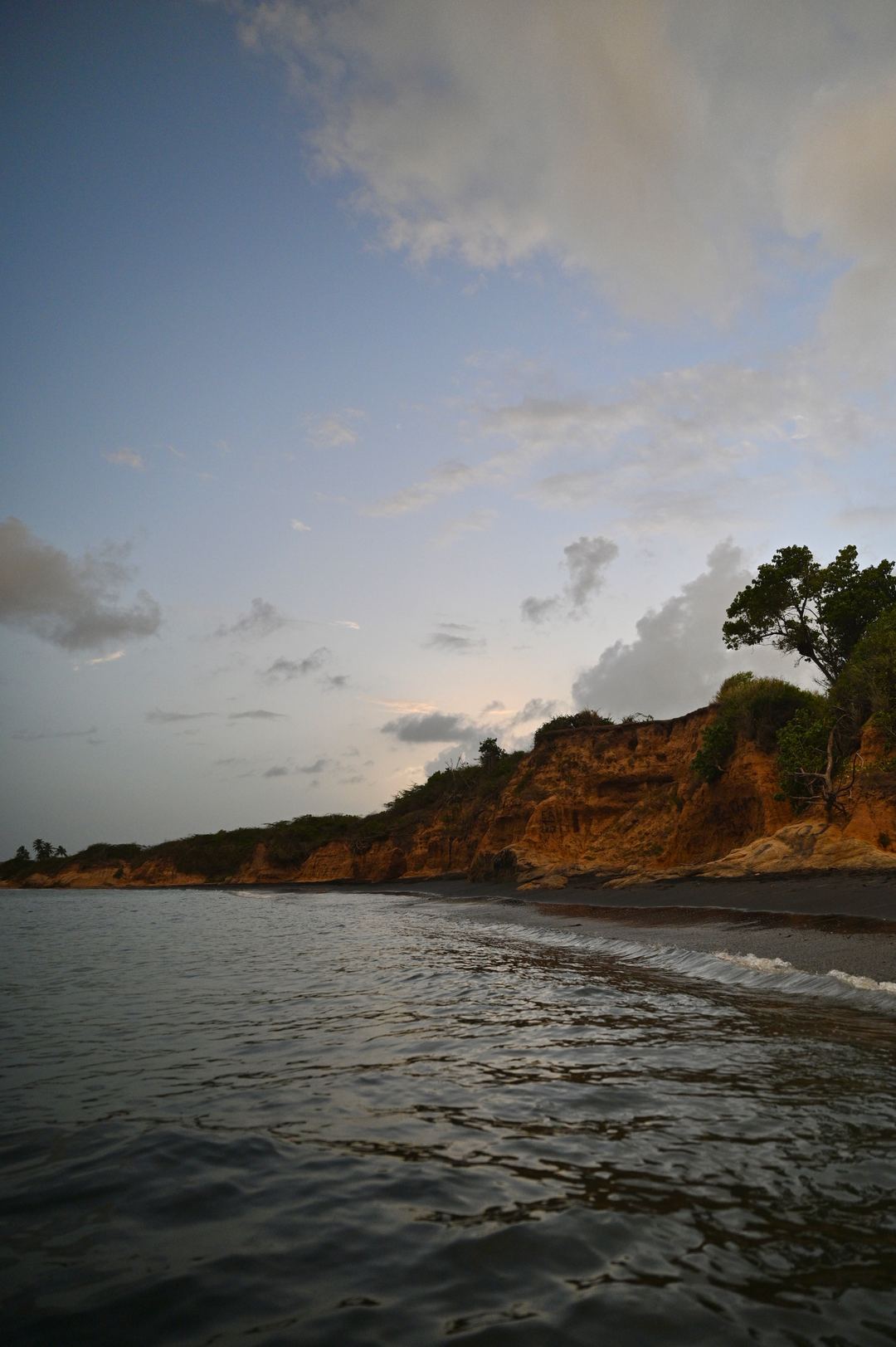 Evening views over a black sand beach in Vieques, PR