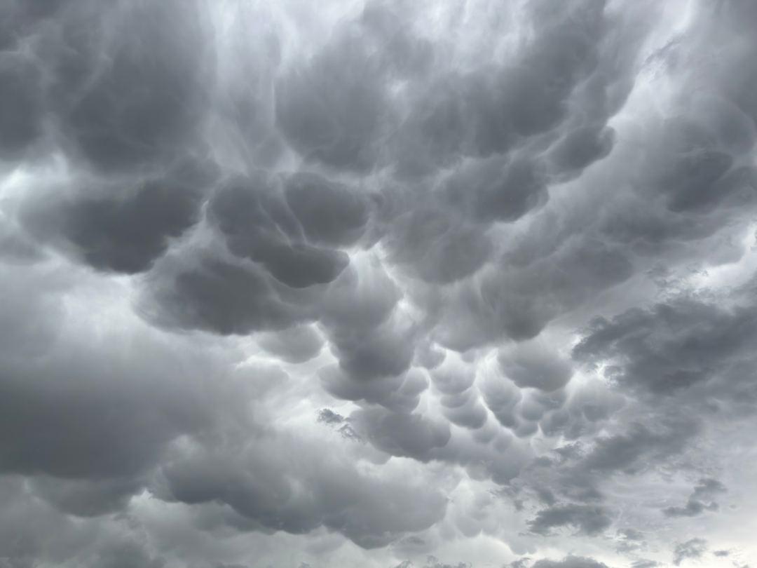 Epic mammatus clouds from below a June hail-producing supercell in Denver 