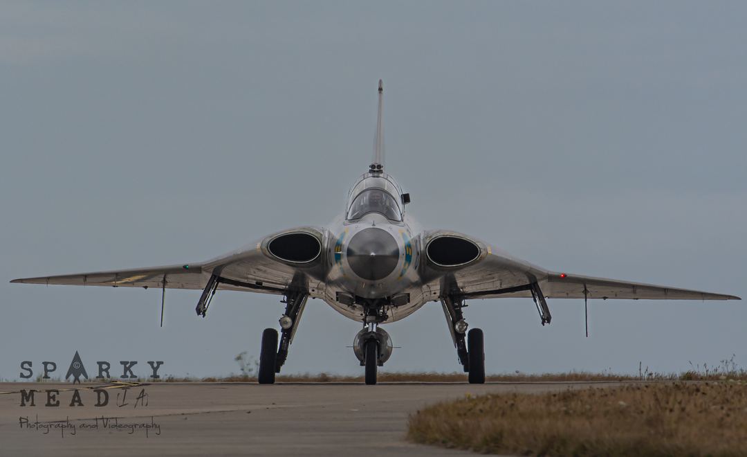 Here comes the Dragon...

I love Cold War jets - seeing where aviation innovation came from helps to see where it is going.  But also the sheer diversity of aircraft types from that era is unmatched, especially when compared to today when air arms around the world seem to be following the same trends.

Among the best examples of Cold War jets are arguably those flown and maintained by the Swedish Air Force Historic Flight, which include this stunning Saab Draken SK35C, seen here heading to the runway at Jersey Airport.