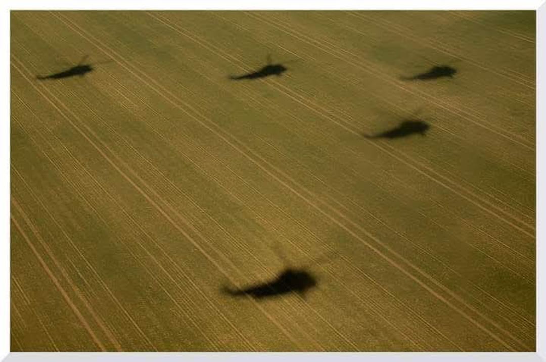 Avengers

To mark the retirement of the Junglie Sea King HC4, 848NAS, using their callsign "Avenger", flew a formation flypast around the South West of England.

I was the Air Engineering Officer of 848NAS at the time and was in the back of Avenger 4, the trailing aircraft on the right hand side.

As we zoomed at lowish  level around  the countryside, I was able to capture our Shadows across a suitably Junglie Green field. 