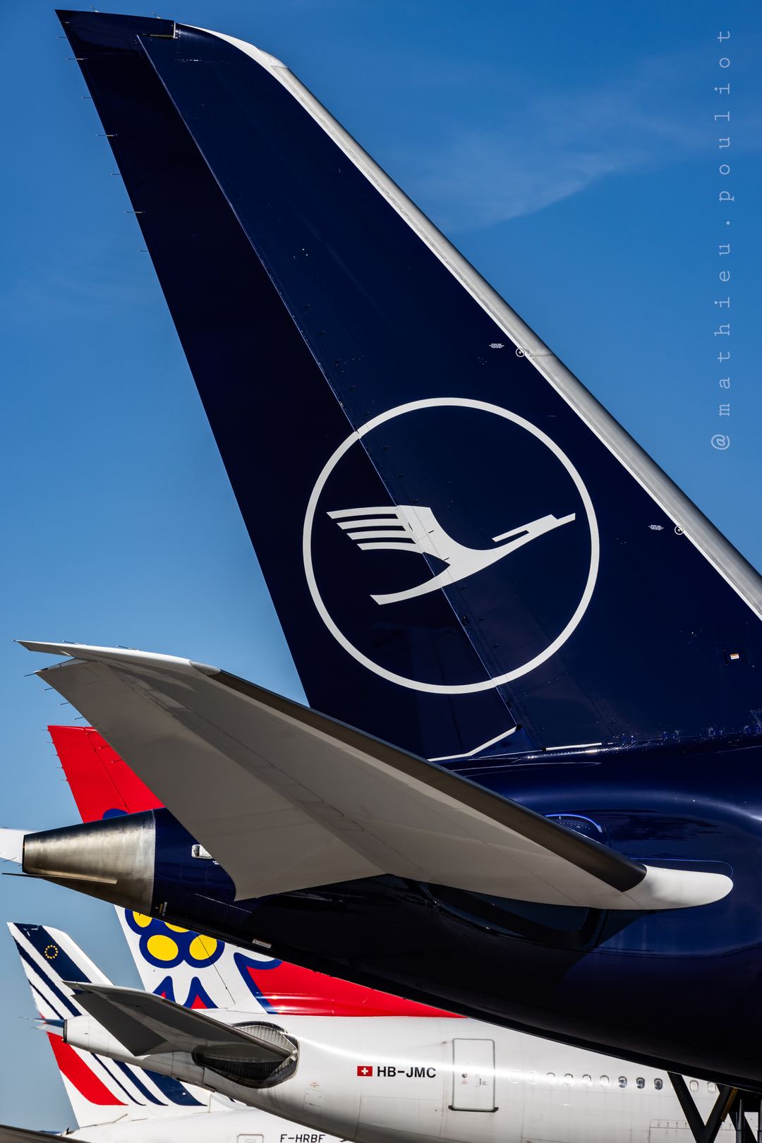 A mix of tails seen in YUL these days. Luftansa and Air France B787 along wing Edelweiss A340.
