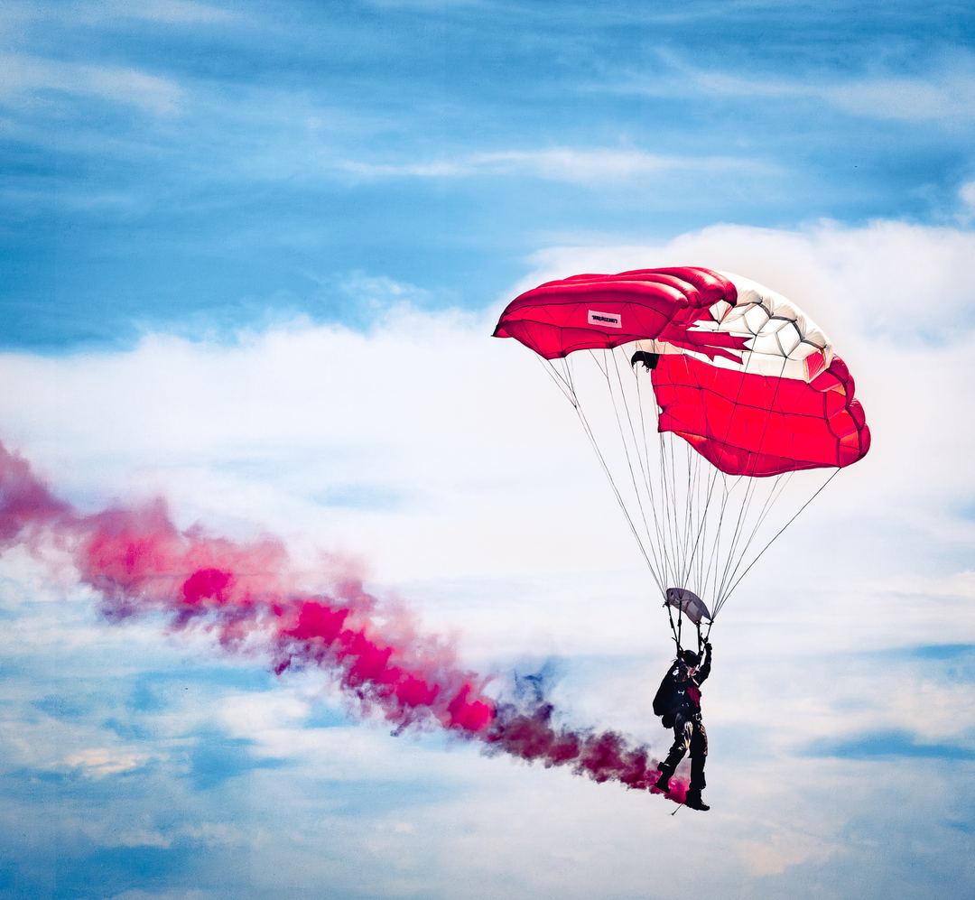 The Canadian Armed Forces Parachute Team - The SkyHawks. Follow for next image of the 3-man formation.