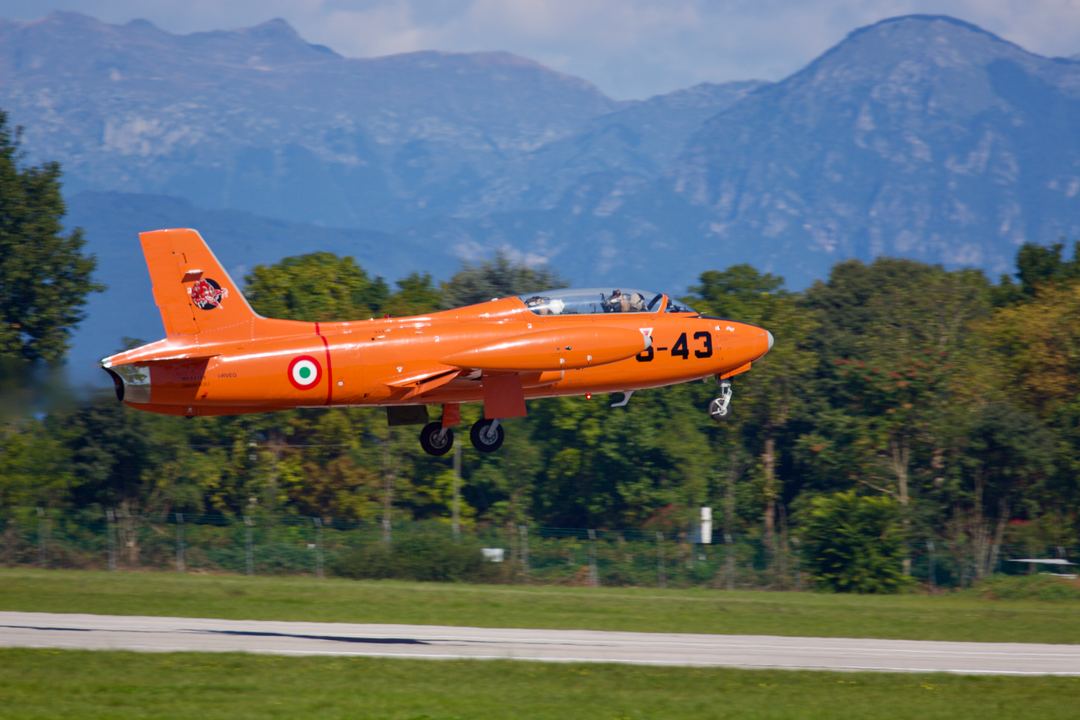 The aircraft pictured is an Aermacchi MB-326, an Italian two-seat jet trainer and light attack aircraft.
