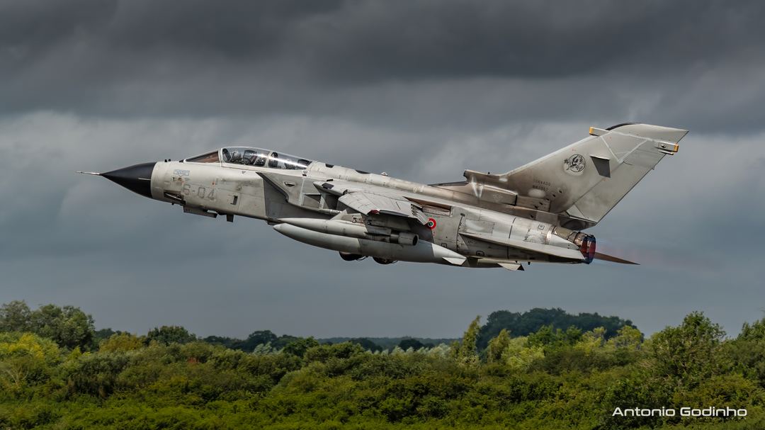 WEATHER

Italian Air Force 6 Stormo A-200 Tornado MM7057/6-04 departing Fairford after being at RIAT 2019 static display.
