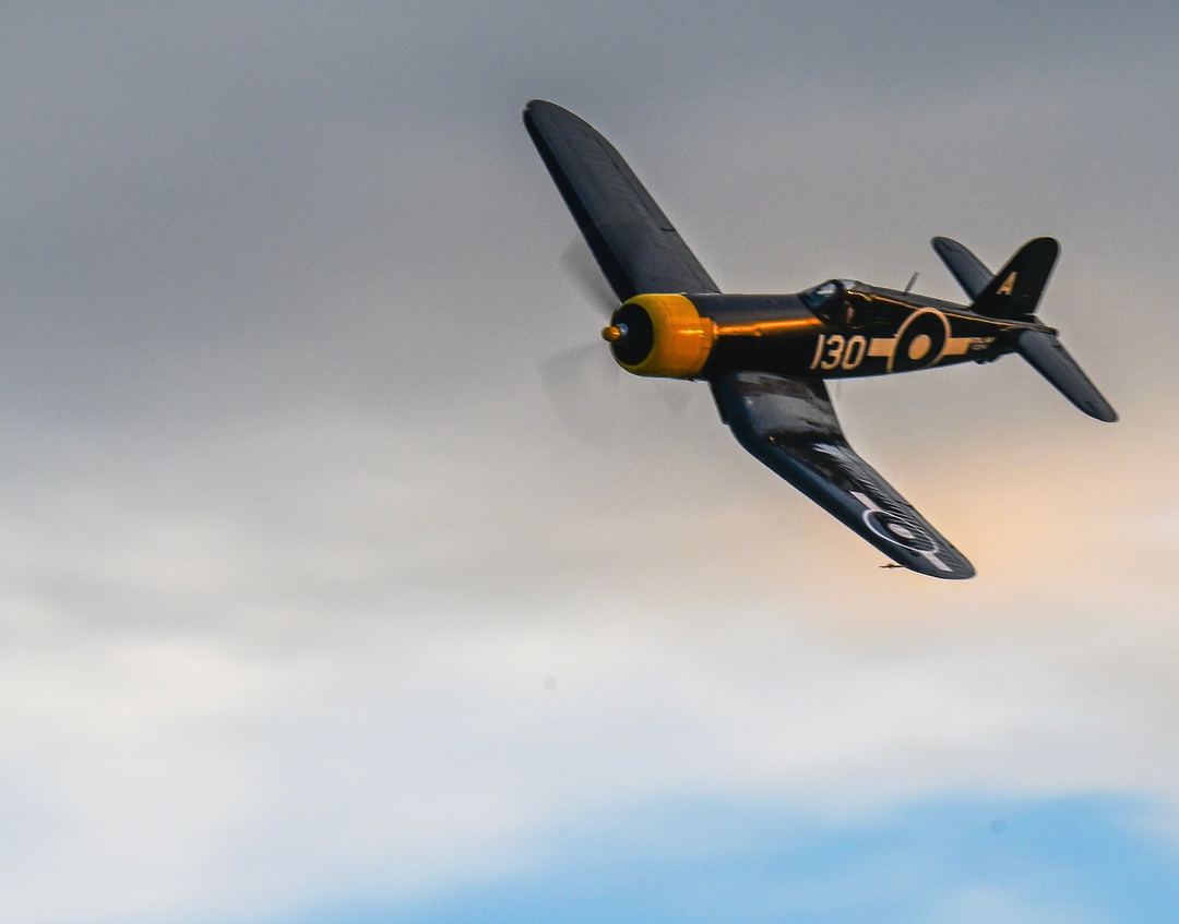 From the 2026 Terre Haute Air Show. This Corsair comes around low-left and captures the beautiful golden hour glow from the sunset behind me. Captured 22-AUG-2026.  @photog_6  Ronald Miller