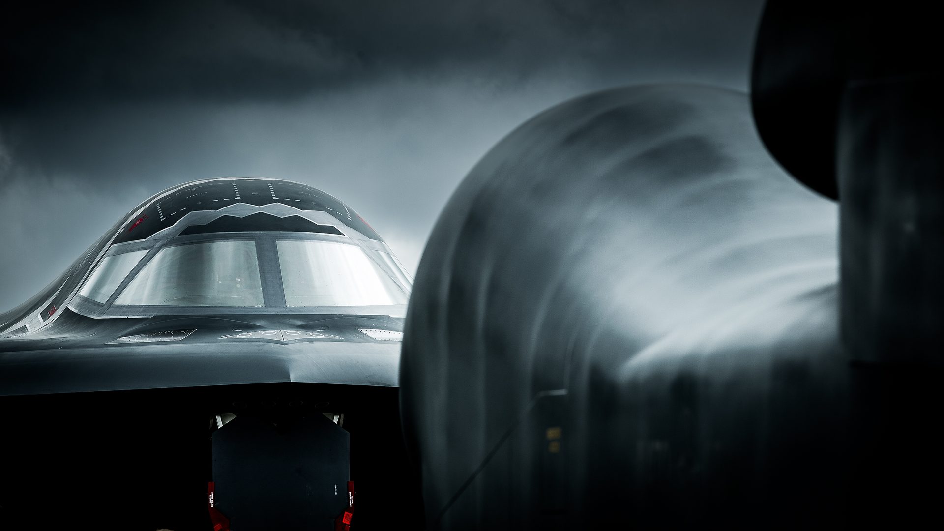 Massive edit to conjure some deadly atmosphere, accentuate angles and highlight 2 very scary machines. That B-2 is pure Darth Vader sinisterness!